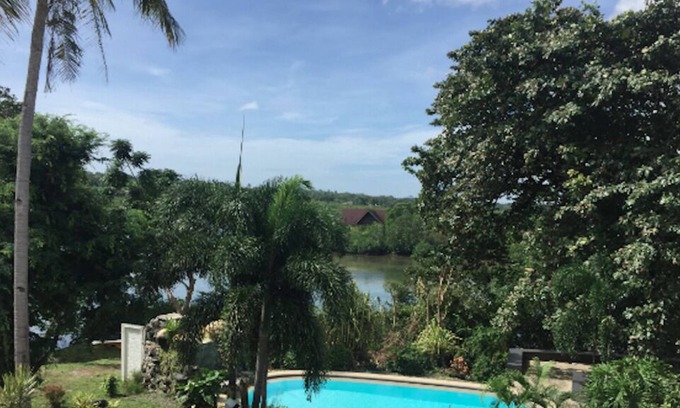 Dauis House | 2 Storey Town House on Lake with Pool in gated secure community.