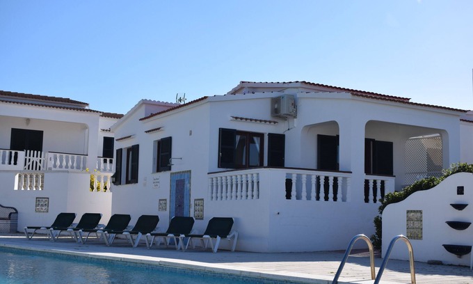 Arenal d'en Castell Villa | 250m from the stunning sandy beach, terrace overlooking the large pool.