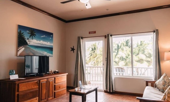 San Pedro Condo | 2BR Beachside FamilySuite@Sapphire Beach Resort