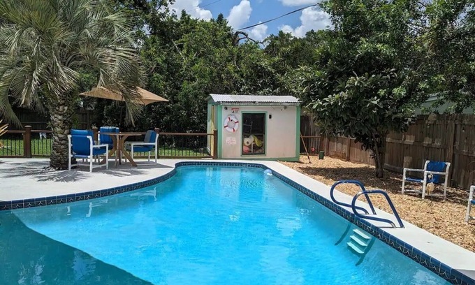 Cocoa House | 3 bed/2 bath house with tropical backyard, pool, fenced yard, hammock