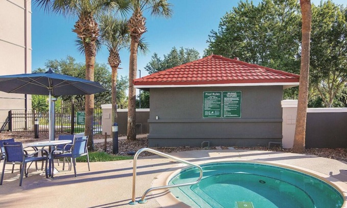 Orlando House | 3 x King Bed Deluxe Suite, Pool View at La Quinta Inn by Wyndham Orlando UCF