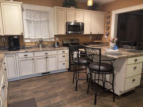Spartanburg House | 4BR Spartanburg Getaway Porch Full Kitchen
