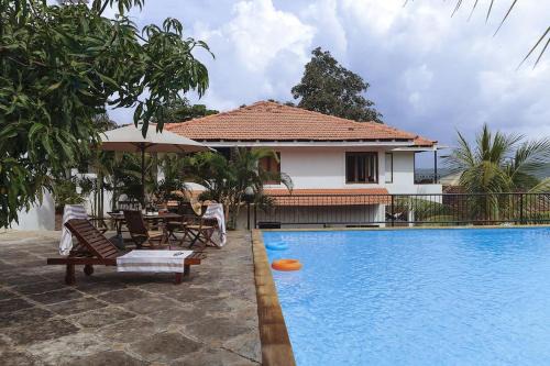 Britona Villa | 5 Tropical Woods 4 BR VillaGoa Pool Cook