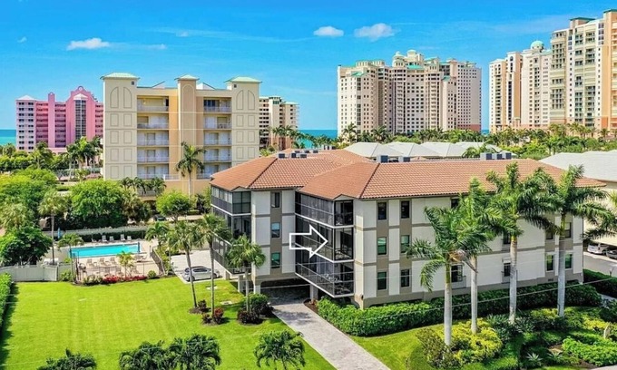 Marco Island Condo | 500 steps from toes in the sand!