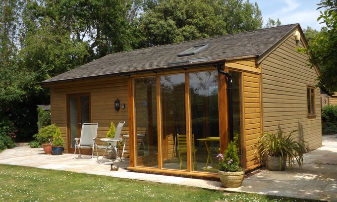 Bognor Regis Ski Chalet | A beautiful pine chalet with its own private garden surrounded by fields