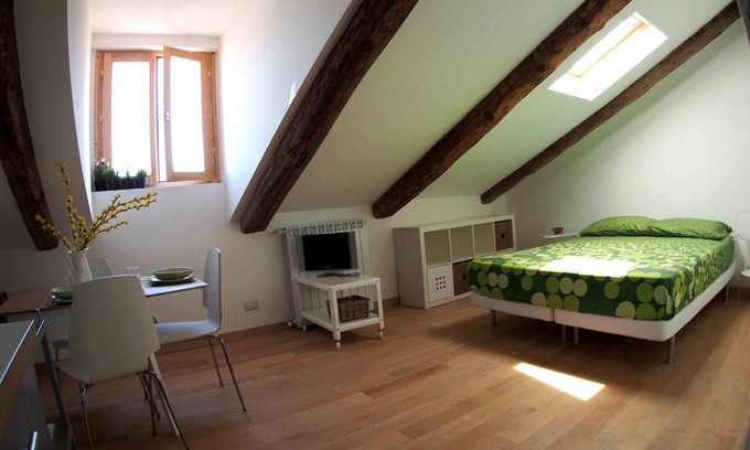Vanchiglia Apartment | A cozy bohemian rooftop nest in downtown Turin