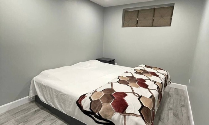 Vaudreuil House | A cozy cool basement for guest