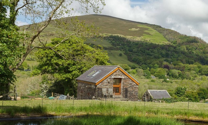Saint Johns Apartment | A delightful one-bedroomed holiday cottage located on a farm, nestled into the hills and enjoying sp