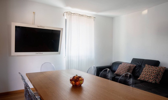 Coste House | A design corner with a view of Etna