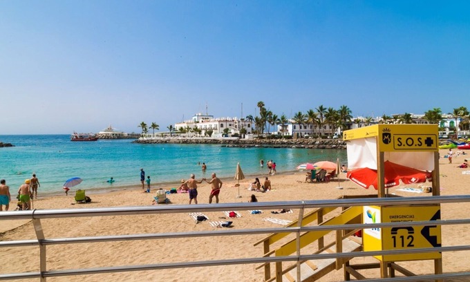Playa de Mogan Apartment | A few meters from the beach with a large terrace and mountain views.