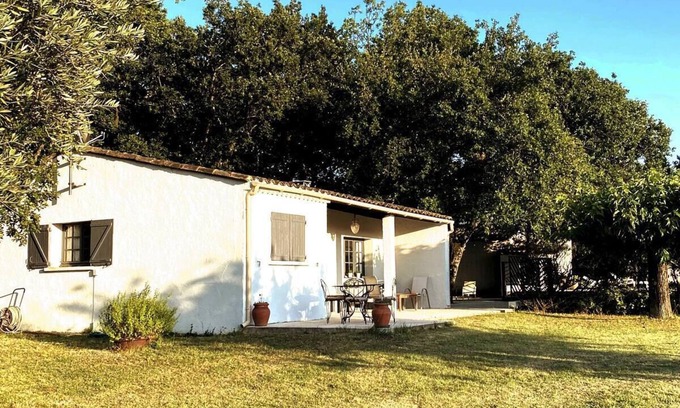 La Begude-de-Mazenc House | A house among the oaks with a swimming pool.