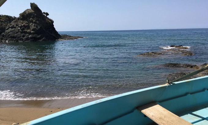 Rosignano Marittimo House | A house directly on the sandy beach with rocky coast, dreamlike object, view unique