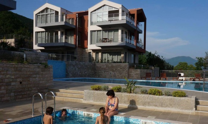 Denovici Apartment | A Penthouse above the sea with a big infinity pool and a children pool