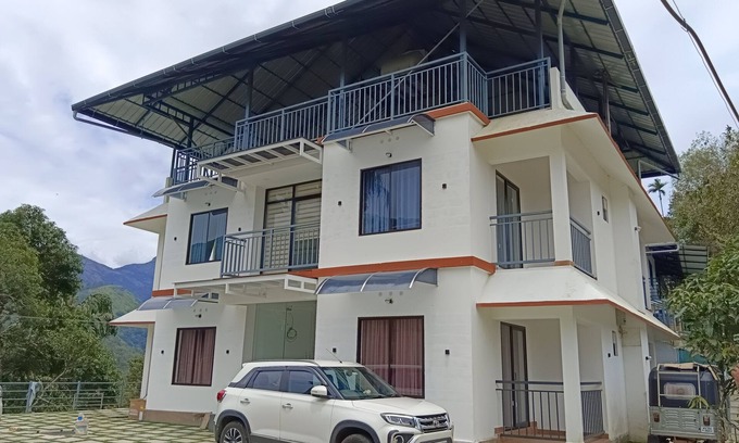 Chithirapuram House | A perfect Homestay with Wi-Fi has 8 Bed Rooms with balcony in Munnar