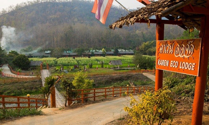 Mae Wang Cabin | a room with rice fields view