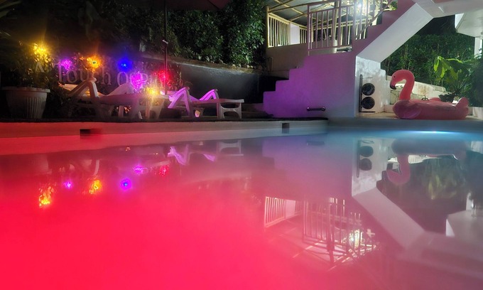 Puerto Princesa Apartment | A touch of pink secret garden resort