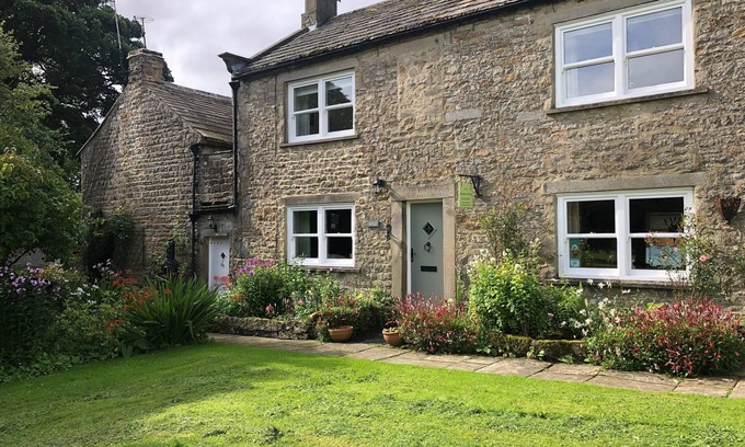 Romaldkirk Cottage | A Traditional Dales Cottage with log burning stove in the village of Romaldkirk.