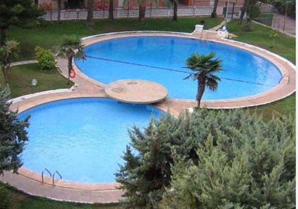 Daimuz Apartment | Acogedor apartamento en Daimús a 150 metros de la playa con parking privado y piscinas comunitarias