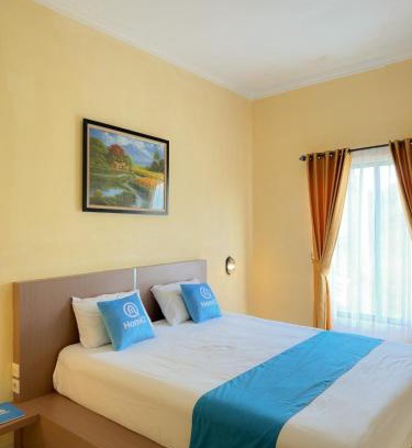 Yogyakarta House | Adiputra Guesthouse Tata Bumi by HomiQ