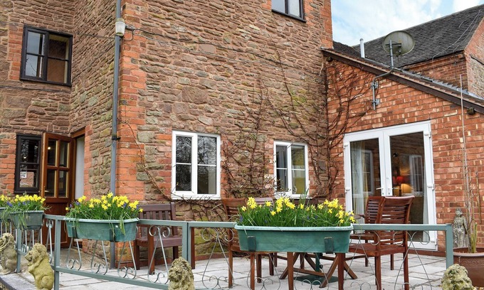 Tenbury Wells Cottage | Adorned with beams throughout.