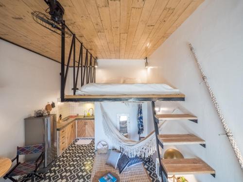Morong Apartment | AGTA Nest Loft in Subic Bay with Self-Serve Breakfast - WiFi, Monkeys, Pet Friendly with a Fee