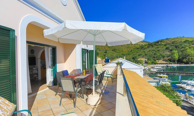Agios Stefanos Apartment | Alexandra Bay Front: Sea Views, WiFi, A/C, Sleeps 6