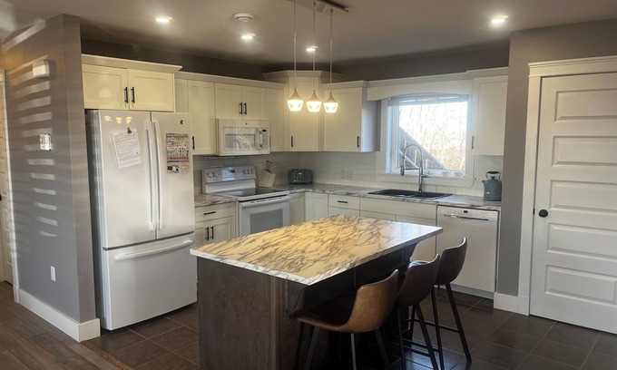 Charlottetown House | All one level 2 bedroom w/King beds in Charlottetown- close to hospital