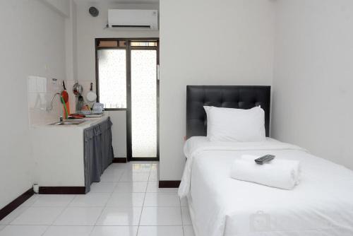 Bekasi Timur Apartment | Alluring Studio at Lagoon Bekasi Town Square Apartment By Travelio