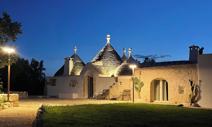 Ceglie Messapica Villa | ALMAPULIA beautiful trulli with private pool and veranda among Apulian olive trees