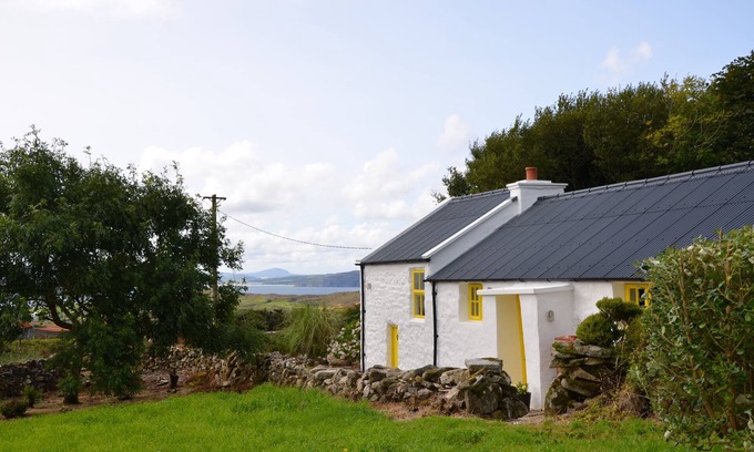 Downings Cottage | An Irish Idyll - traditional stonewall cottage nestled in hills above Downings
