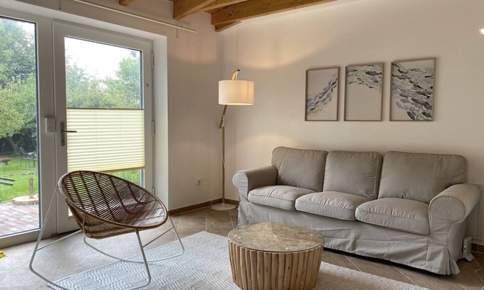 Pilsum Apartment | "Ankerplatz" vacation apartment with large garden in the heart of Pilsum
