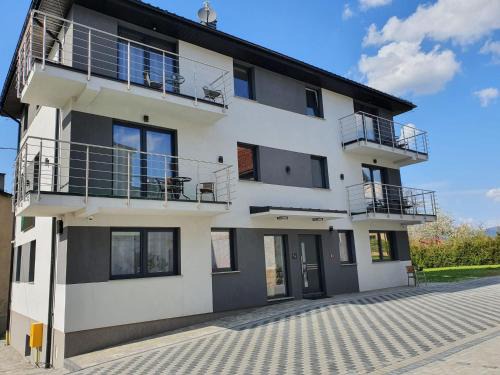 Miedzylesie Apartment | Apartamenty Wakacyjne Historie