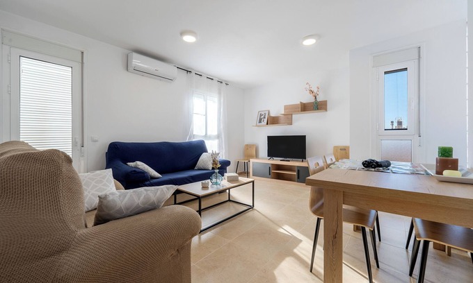 Sant Carles de la Rapita Apartment | Apartment 'Els Pilanets' with Wi-Fi and Air Conditioning