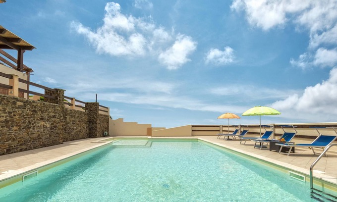 Sassari Apartment | Apartment "App 4 Posti con Terrazza Vista Mare" with Sea View, Pool, Wi-Fi, Garden & Terrace