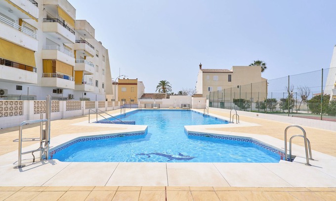 Caleta de Velez Apartment | Apartment 'Beachside Bliss' with Shared Pool, Wi-Fi and Air Conditioning