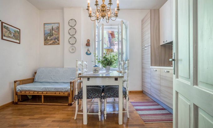 Sella Giudicarie Apartment | Apartment 'Casa Nel Borgo Edera' with Mountain View and Shared Garden