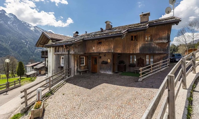 Vigo di Fassa Apartment | Apartment "Ciasa Sommavilla Calendula" with Mountain View, Shared Garden & Wi-Fi