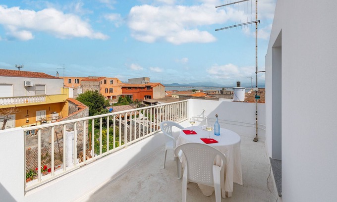 Sant'Antioco Apartment | Apartment 'Domo De Maria' with Sea View, Private Terrace and Air Conditioning