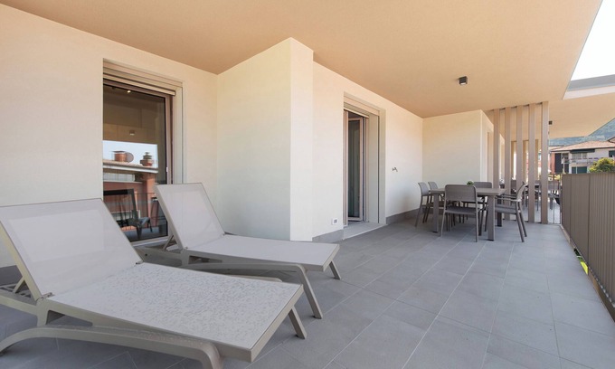 Garda Apartment | Apartment 'Eleonora C3' with Shared Pool, Private Terrace and Air Conditioning