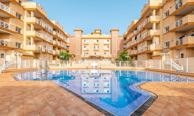 Lo Pagan Apartment | Apartment '1209golfdbeach' with Shared Pool, Wi-Fi and Air Conditioning