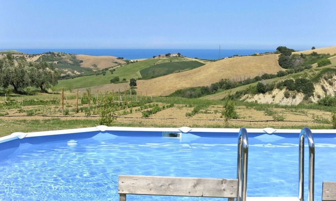 Cologna Spiaggia Villa | Apartment in villa with pool, A/C, hot tub, WIFI, TV, patio, pets allowed, panoramic view, parking