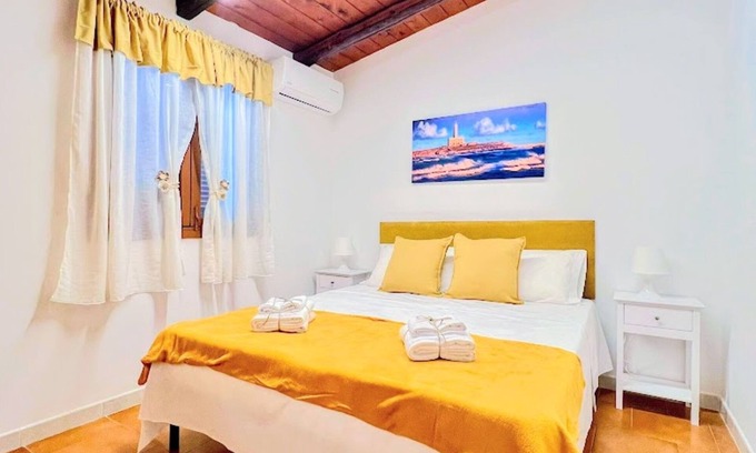 Montincello Apartment | Apartment 'La Mignola - Bilo 2 - Duplicate' with Shared Garden, Wi-Fi and Air Conditioning