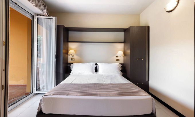 Loano Apartment | Apartment "Loano2 - Bilo Terra - Villaggio"; private garden, shared pools and Wi-Fi