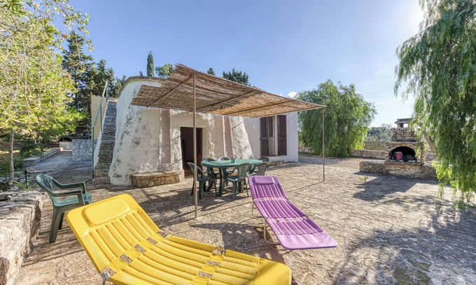 Lido Marini Apartment | Apartment 'Lucy' with Sea View, Private Garden and Wi-Fi