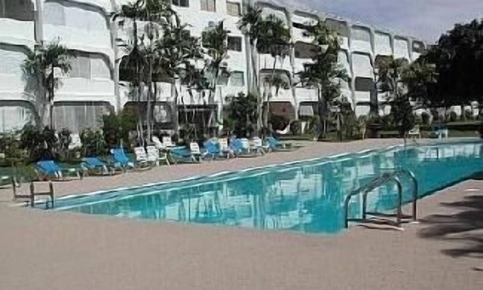 Sunset Crest Apartment | Apartment On Beautiful Grounds With Large Swimming Pool Near Beach
