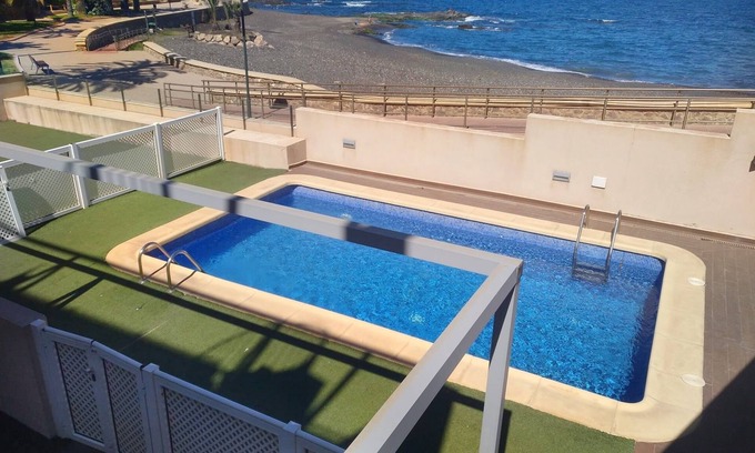 Villaricos Apartment | Apartment on the seafront with swimming pool, air conditioning/heating