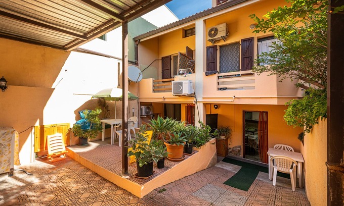 Quartu Sant'Elena Apartment | Apartment "Villa Gianna - Toscano" with Private Terraces, Shared Garden & Wi-Fi