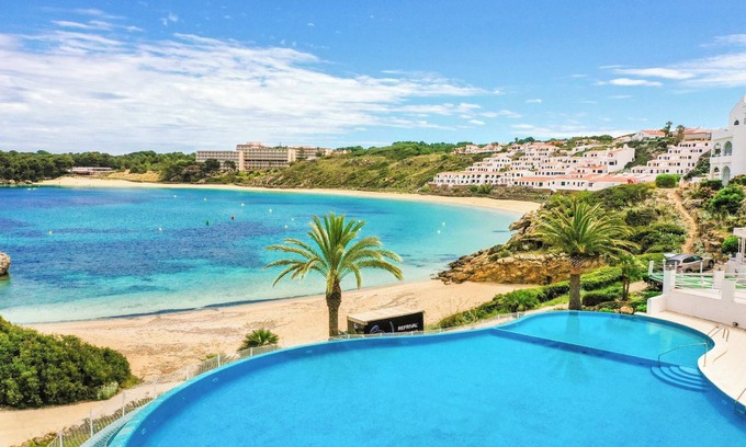 Arenal d'en Castell Apartment | Apartment "White Sands 306" on the Beach with Sea View, Pool