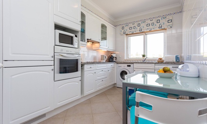Atalaia Apartment | Apartment with heated communal pool, golf view, sky sport channels, and spa acce