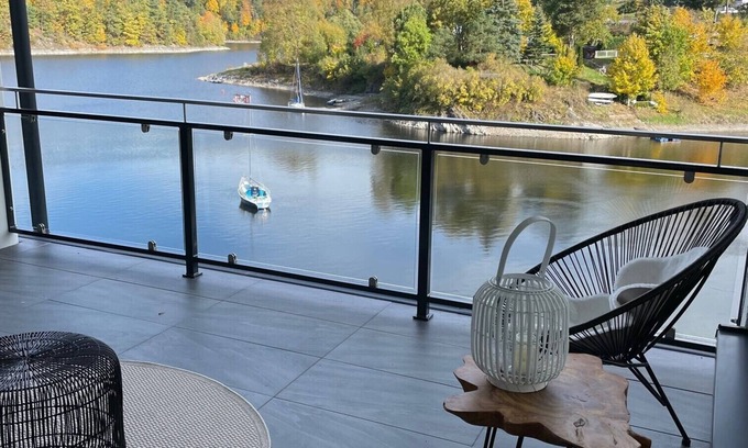Saaldorf Condo | Apartments- Saaldorf WG 6 with balcony and view of the reservoir